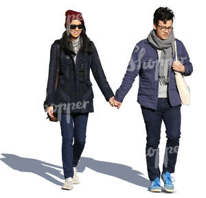 young asian couple walking hand in hand