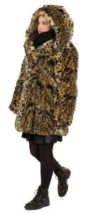 woman in a hooded fur coat walking
