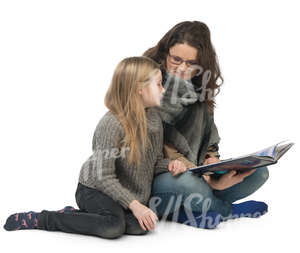 mother and daughter sitting and reading a book