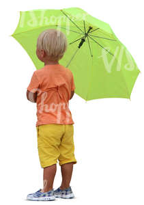 little boy standing with an umbrella