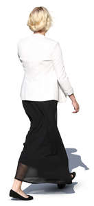 woman in a black and white costume walking