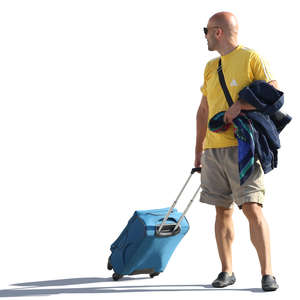 backlit man with a suitcase standing