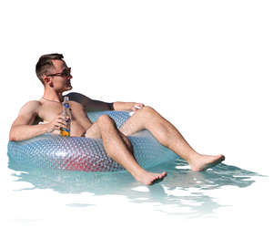 man floating with a swimming ring in a pool