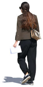 woman with long brown hair walking