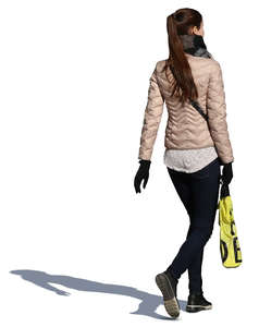 woman with a shopping bag walking