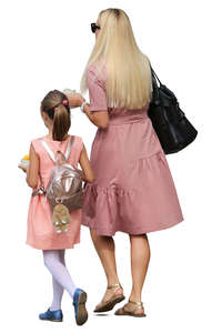 mother and daughter in pink dresses walking