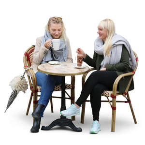 two women sitting in a cafe on a cloudy day