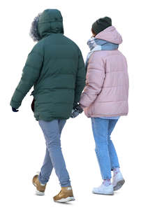 couple walking hand in hand in winter