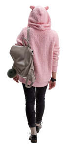 woman in a pink hooded sweater walking