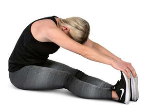 woman stretching in a gym