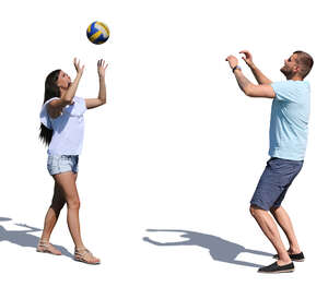 man and woman playing volleyball