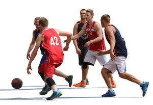 five men playing street basketball