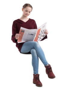 young woman sitting and reading a newspaper