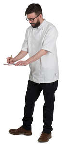 chef standing and writing orders