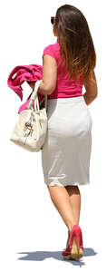 woman in a pink and white outfit walking