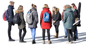 group of young people standing and talking