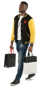 black man with shopping bags walking