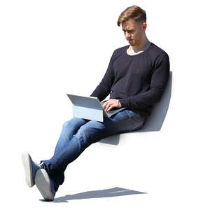 man sitting with laptop on his knees