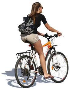 woman riding a bicycle in the summer