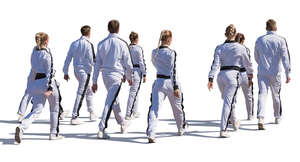 group of people in sports uniform walking