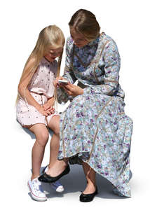 mother and daughter sitting together