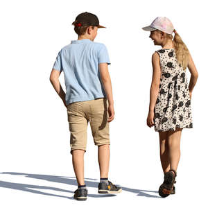 two children walking in summertime