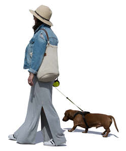 woman with a dachshund walking