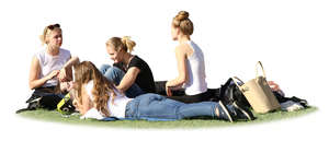 group of young women relaxing in the park