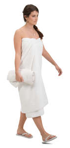 woman wrapped in a spa towel walking - VIShopper