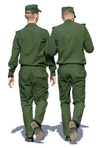 two soldiers in uniforms walking