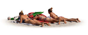 three women sunbathing on a beach