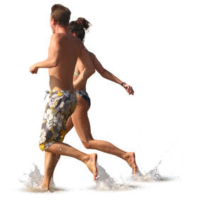 man and woman running hand in hand into water