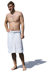 man with a towel standing in sunlight