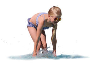 little girl standing in the water