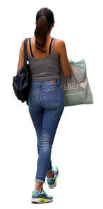 woman with a shopping bag walking