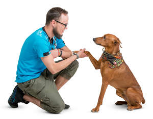 man playing with his dog