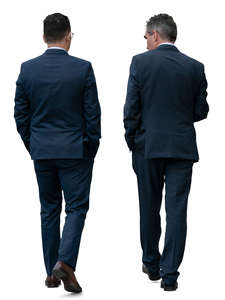 two businessmen walking and talking