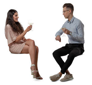 man and woman sitting in a restaurant