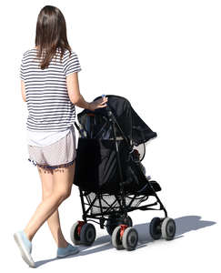 woman in a summer outfit walking with a stroller