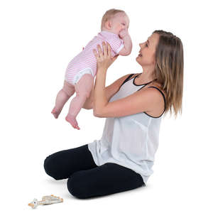 woman playing with her baby daughter