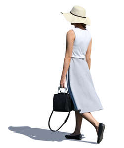 woman with a hat walking