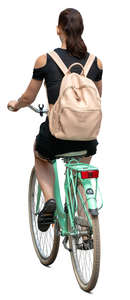 woman with a backpack riding a bicycle