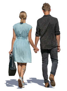 man and woman walking hand in hand