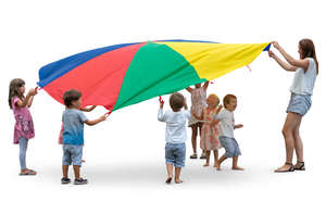 group of children playing with parachute