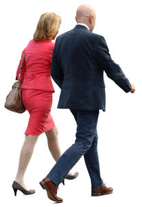 businesswoman and businessman walking