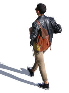 man with a suede backpack walking seen from above