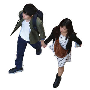 asian couple walking hand in hand seen from above