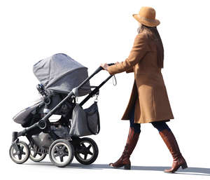 woman in a brown coat walking with a stroller