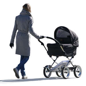 woman in a grey jacket walking with a baby carriage