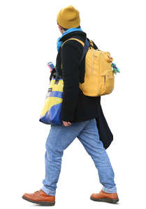 man with many colorful bags walking